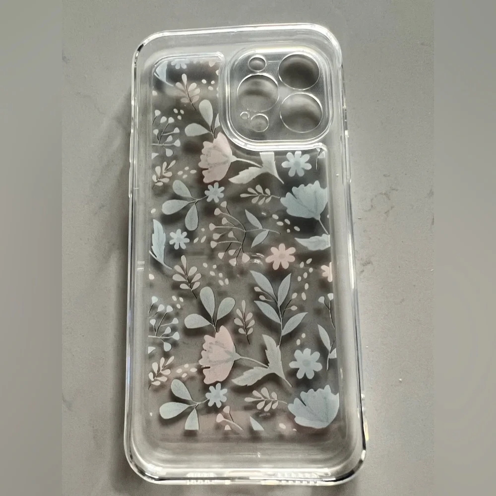 NWOT never used iPhone 13 Pro Max case. Clear lightweight case with flowers.